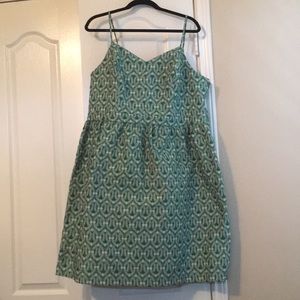 Green and white brocade dress